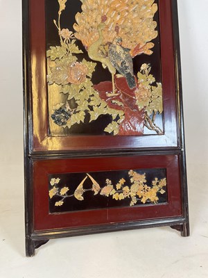 Lot 492 - A carved and inlaid soapstone peacock screen,...