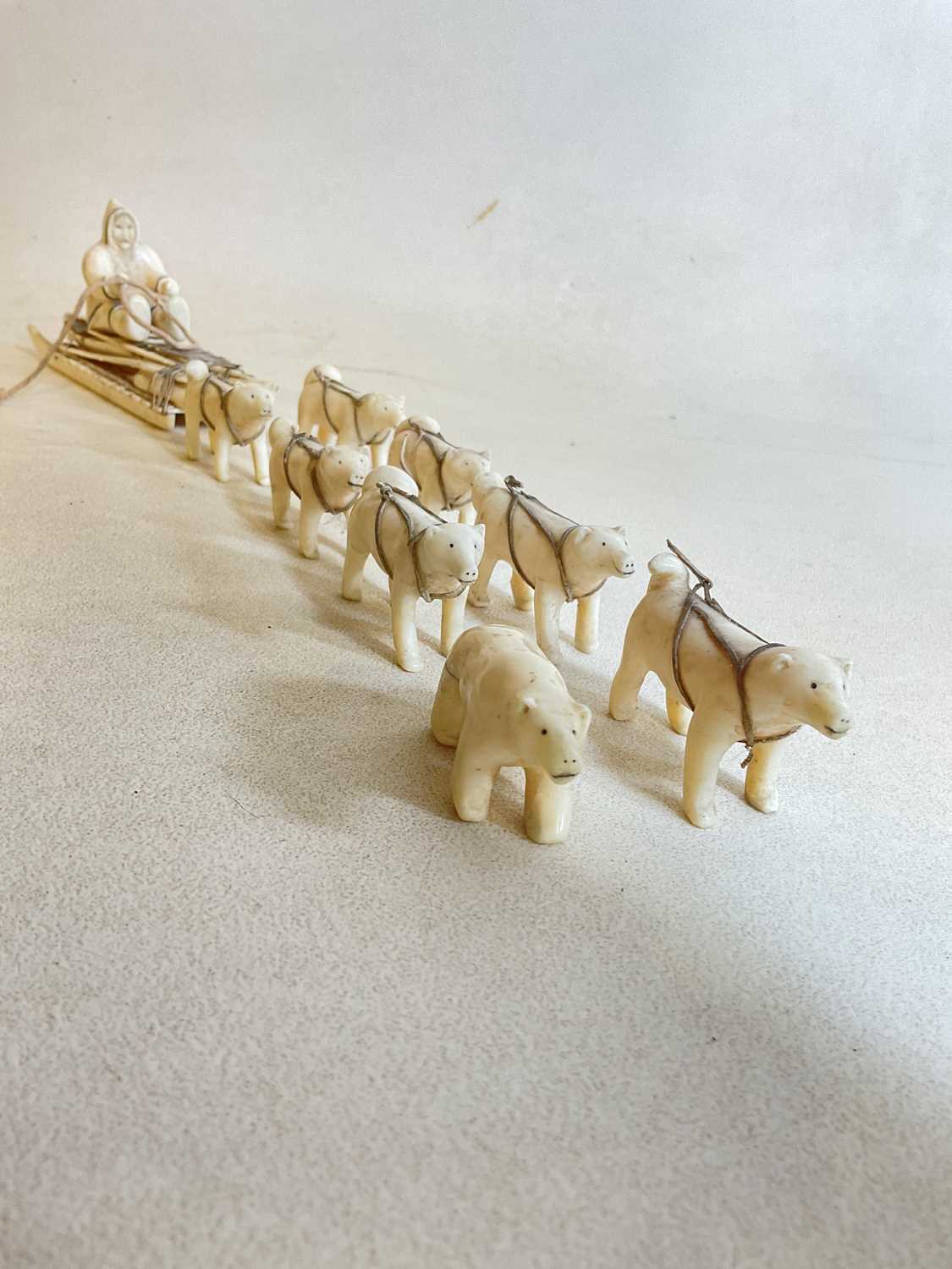 Lot 55 - A rare Inuit walrus ivory hunting sledge with...