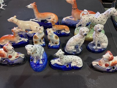 Lot 262 - A group of Staffordshire animals, comprising...