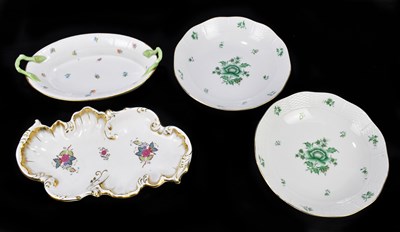 Lot 487 - HEREND; a pair of bowls with basket weave moulded decoration