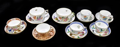 Lot 485 - HEREND; a collection porcelain tea cups and saucers