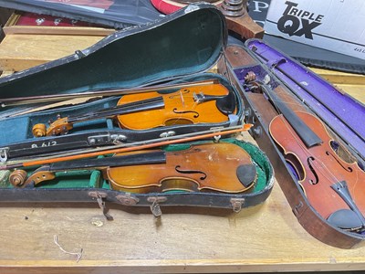 Lot 307 - Three cased violins, for restoration.