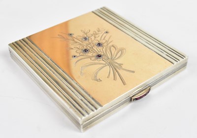 Lot 767 - A white metal compact/portable mirror, the lid...