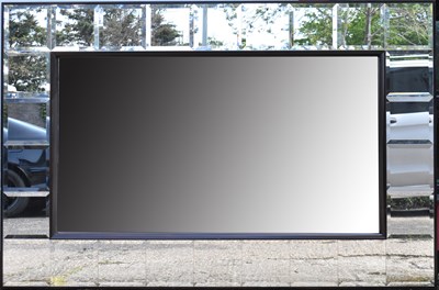 Lot 60 - A huge modern rectangular wall mirror, the...