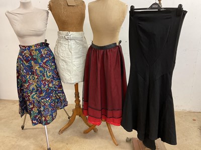 Lot 190 - Vintage skirts including a cream leatherette...