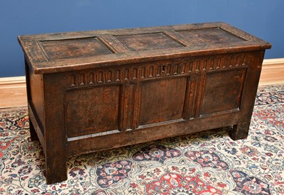 Lot 2523 - An 18th century oak coffer, with carved and...