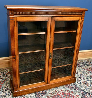 Lot 2420 - A late 19th century carved walnut bookcase,...