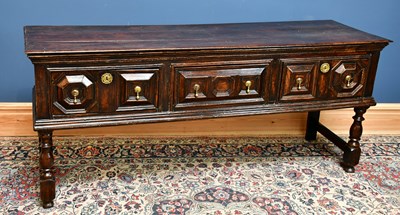 Lot 2509 - A 17th century Jacobean style oak dresser base,...