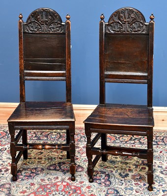 Lot 2515 - A pair of 18th century carved oak hall chairs,...