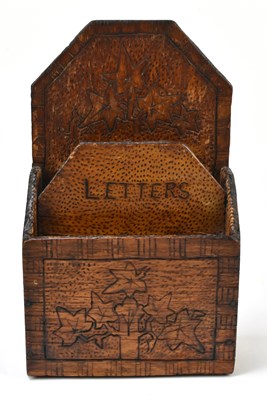 Lot 159 - An early 20th century poker work two division letter rack