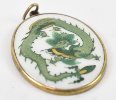 Lot 935 - MEISSEN; a 20th century oval dragon pendant...
