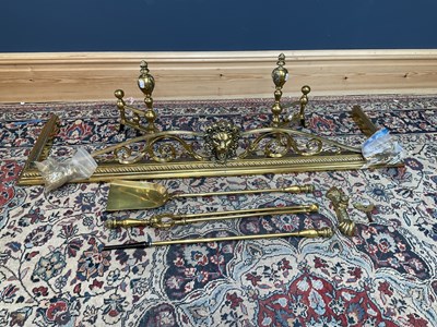 Lot 2142 - A 19th century brass fire set, comprising...