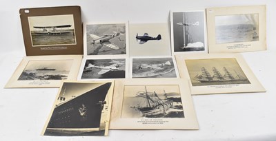 Lot 657 - A group of eleven picture of planes and boats...