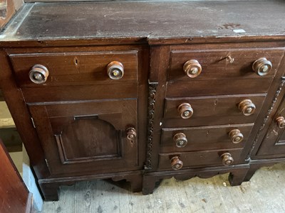 Lot 11 - A 19th century simulated oak pine breakfront...