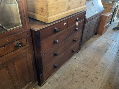Lot 34 - A 19th century mahogany chest of two short...