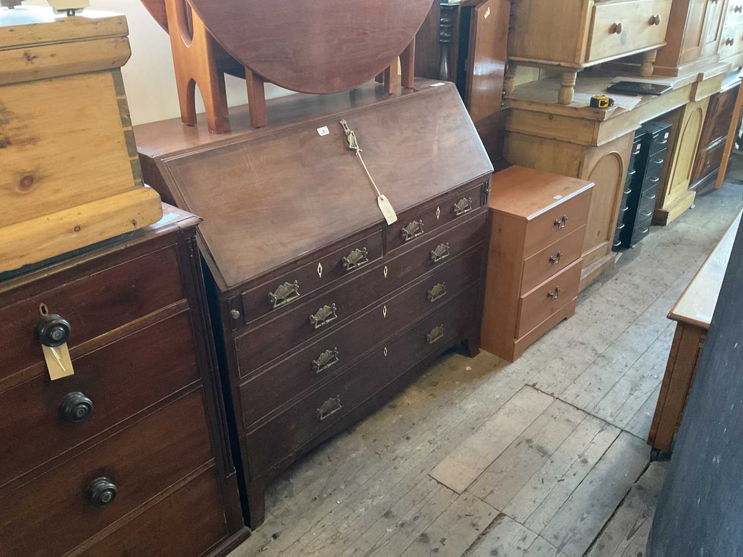 Lot 35 - A late 18th century mahogany bureau, the fall...