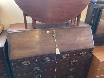 Lot 35 - A late 18th century mahogany bureau, the fall...