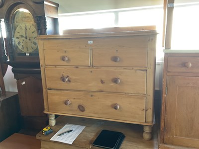 Lot 36 - A pine chest of two short over two long...