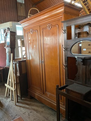 Lot 59 - An oak armoire with moulded cornice and carved...