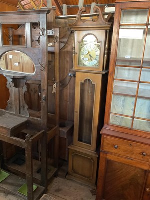 Lot 61 - A modern oak effect longcase clock, the brass...