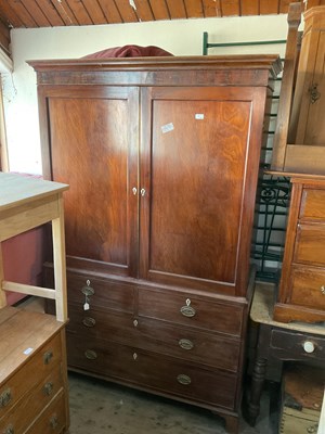 Lot 67 - A 19th century mahogany press cupboard with...