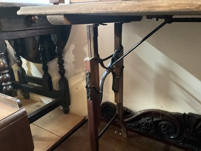 Lot 77 - A vintage folding table, width 90cm, with a...