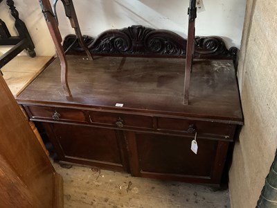 Lot 79 - A 19th century mahogany sideboard with carved...