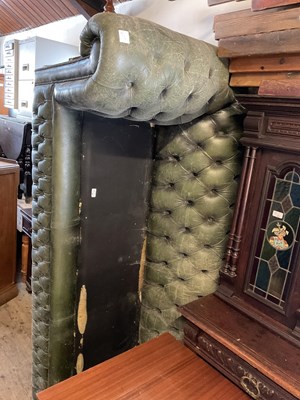 Lot 80 - A green leather Chesterfield three seater sofa...