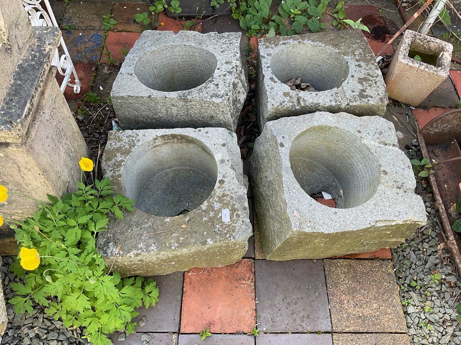 Lot 100 - Four modern concrete planters.