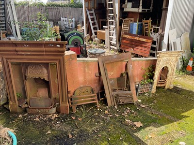 Lot 119 - Three cast iron fireplaces, with assorted fire...