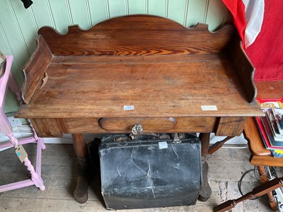 Lot 155 - A Victorian pine washstand with raised back...