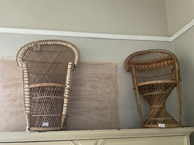 Lot 196 - Two childrens' wicker peacock chairs (2)