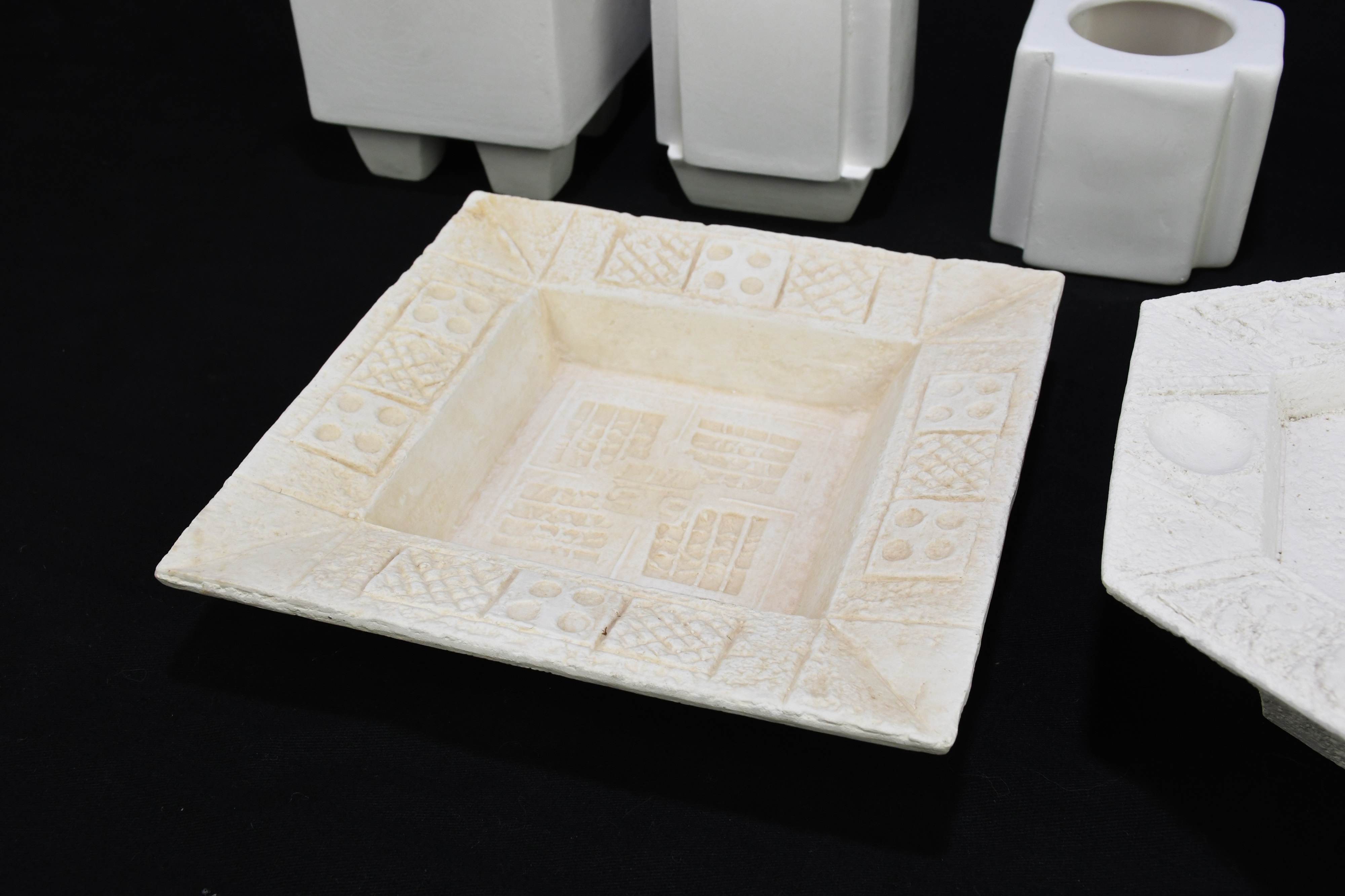 Lot 1450 TROIKA POTTERY; seven pieces of bisque ware,