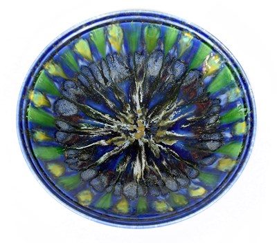 Lot 248 - POOLE POTTERY; a large dish decorated with a...