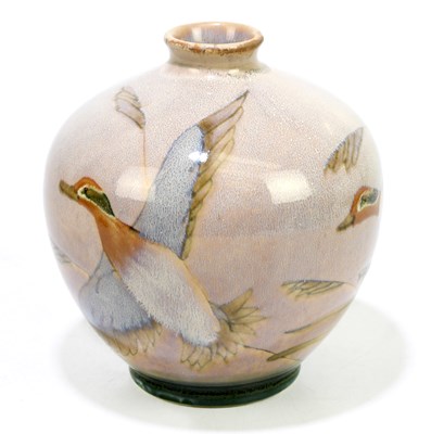 Lot 197 - COBRIDGE; a limited edition vase of bulbous...