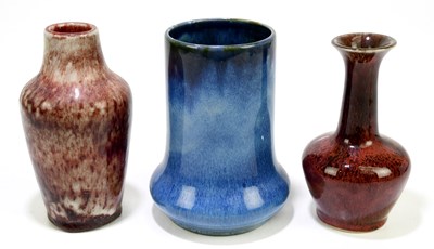 Lot 195 - COBRIDGE; three stoneware vases, including an...