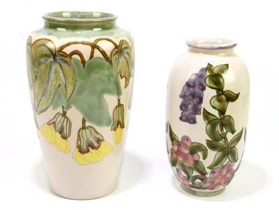 Lot 192 - COBRIDGE STONEWARE; two vases with floral...