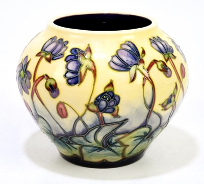 Lot 65 - EMMA BOSSONS FOR MOORCROFT; a squat bowl...