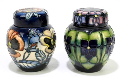 Lot 53 - MOORCROFT; two ginger jars and covers,...