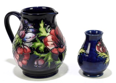 Lot 40 - MOORCROFT; two pieces decorated in the...