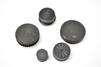 Lot 26 - A late 19th century carved bog oak circular snuff box