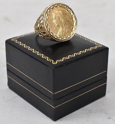 Lot 845 - A Victorian full sovereign, 1896, in 9ct ring...