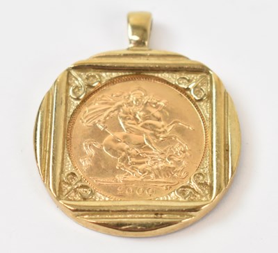 Lot 960 - An Elizabeth II half sovereign, 2000, set in...