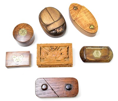 Lot 28 - A collection of treen snuff boxes