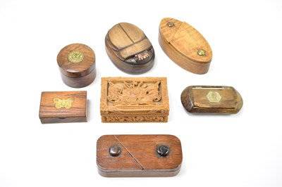 Lot 28 - A collection of treen snuff boxes