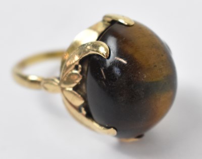 Lot 921 - A yellow metal ring set with large central...