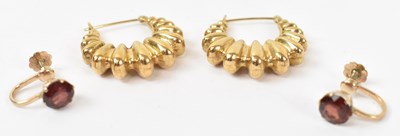 Lot 910 - A pair of 9ct yellow gold earrings, approx...