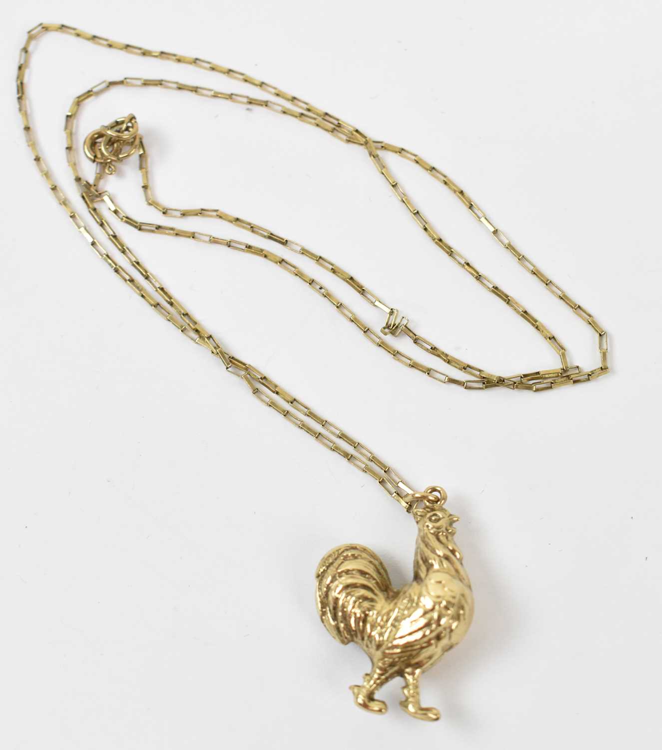 Lot 891 - A 9ct yellow gold necklace with 9ct yellow...