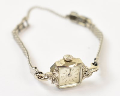 Lot 947 - ZODIAC; a 14ct white gold lady's wristwatch on...