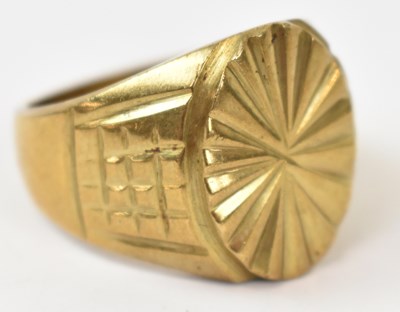 Lot 873 - A yellow metal gents ring, stamped 18k, size...